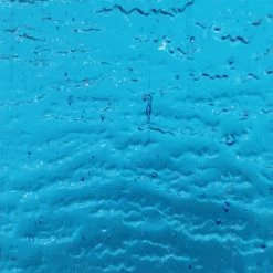 Kokomo Light Peacock Blue Transparent Rolled Granite